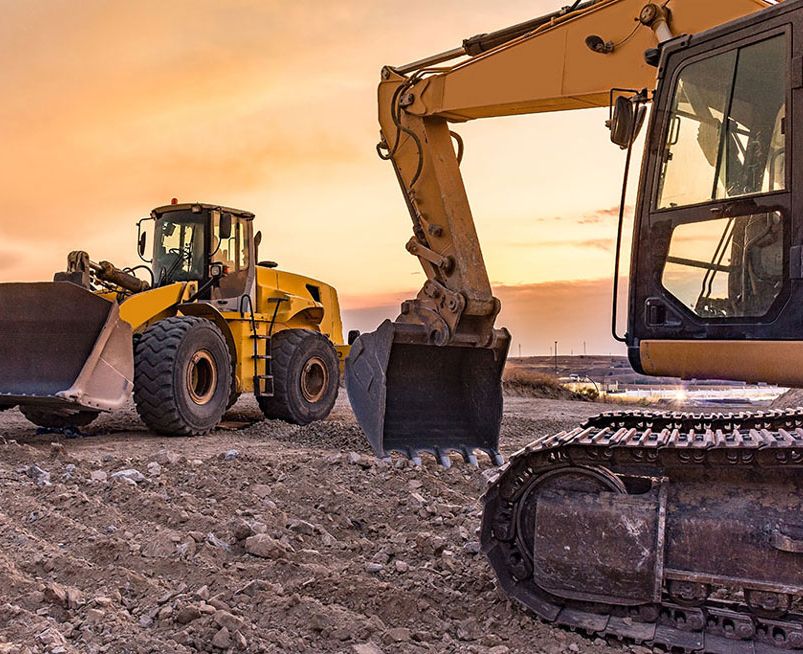 Werbeagentur für den Bau - Bagger im Sonnenuntergang